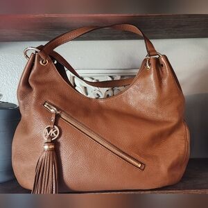 Michael Kors Leather tassle bag in Saddle Brown